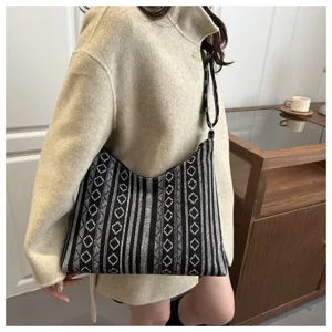 Ethnic style black and white woven underarm bag, casual geometric diamond pattern shoulder bag.