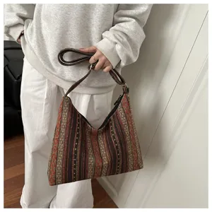 Ethnic style woven shoulder bag, vintage geometric patterned underarm bag for women daily wear.