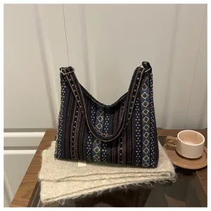 Ethnic style woven shoulder bag for women, large capacity underarm hobo bag daily use.