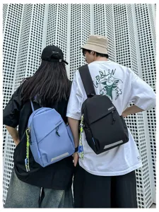 Sac à dos et sac de poitrine unisexes décontractés, design léger et élégant pour voyages quotidiens.