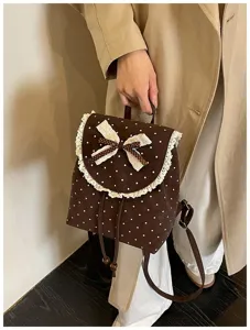 Sweet polka dot backpack with delicate lace trim and cute bow design for daily casual wear.