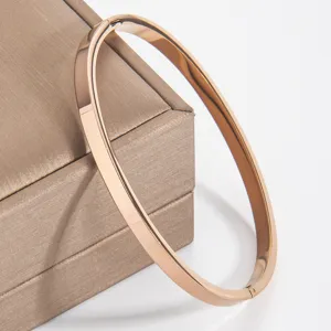 Minimalist 18k rose gold plated stainless steel smooth hinge bangle bracelet for women.