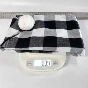 Black and white buffalo plaid chair cover Christmas dining table festive decoration