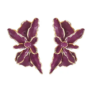 Exaggerated purple flower earrings with gold trim, unique resort style statement jewelry.