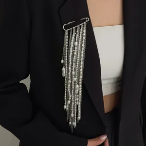 Chic oversized safety pin brooch with multi-strand silver chains and pearls for women apparel.