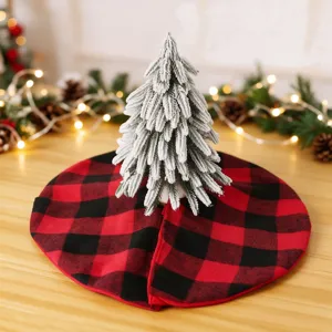 Red and black buffalo plaid Christmas tree skirt with frosted mini tree for table holiday decor.