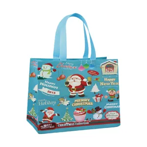 Sac de shopping non tissé de Noël bleu avec impression du Père Noël, sac cadeau durable vue de détail.
