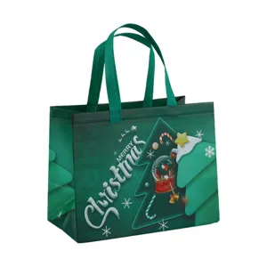 Sac de shopping de Noël vert en intissé avec motifs de sapin et de flocons.
