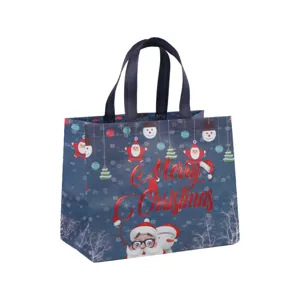 Sac de shopping de Noël en intissé épais avec charmant Père Noël et inscription festive.