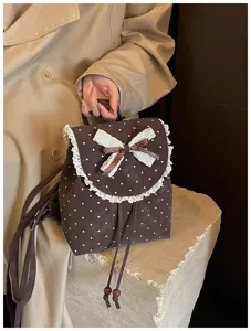 Cute polka dot backpack with lace trim and bow, trendy sweet retro daily small bag for women.