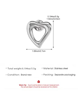 Stainless steel heart brooch pin, simple silver metal hollow design with compact size.