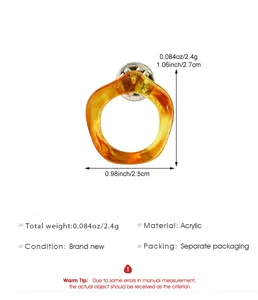 Broche lunettes en acrylique ambré pour femmes, accessoire design anneau minimaliste élégant.