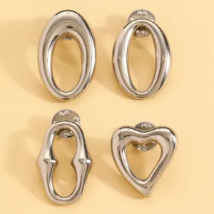 Silver metallic geometric heart and oval brooches set, stylish suit pin accessories for women.