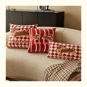 Detailed view of red plaid and stripe cartoon puppy throw pillows, soft cushion cover.
