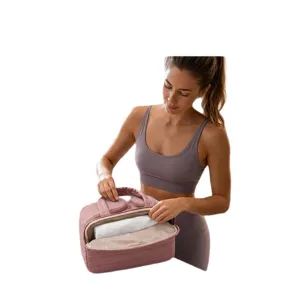 Quilted travel cosmetic bag with handle for women, waterproof makeup storage organizer for daily use.
