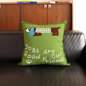 Detailed view of a vintage dachshund green throw pillow with cute graphic print on sofa.