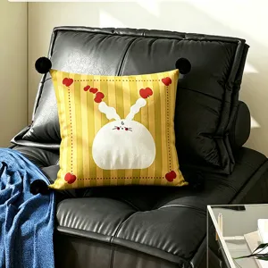 Cute cartoon rabbit print throw pillow with plush pom poms for living room sofa decoration.