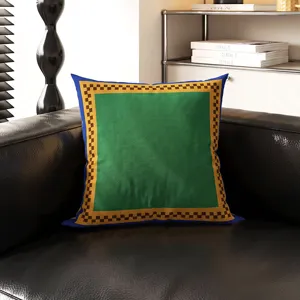 Close-up detail of the Bauhaus style throw pillow featuring vibrant geometric pattern.
