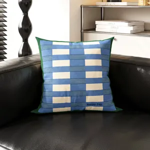 Detailed view of the Bauhaus geometric grid cushion cover featuring blue and white stripes.