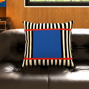 Fundas de cojín geométricas retro con bloques de colores negros, blancos, rojos y azules.