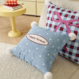 Cute bow and polka dot throw pillow with pom poms for living room sofa bedroom decor.