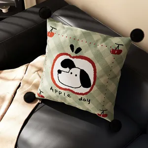 Green plaid cartoon dog throw pillow with cute apple pattern and black pom poms for living room sofa.