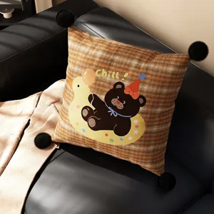 British style cartoon animal throw pillow, brown plaid cushion with cute bear and pom poms.