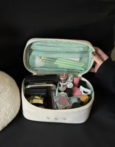 Large capacity cosmetic bag with flower embroidery, portable travel makeup storage pouch.