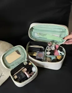 Large capacity floral cosmetic bag with mirror, portable makeup organizer for travel.