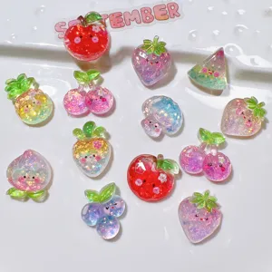 Colorful resin fruit charms, DIY craft cabochons with glitter and cute smiling faces.