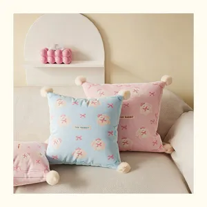 Cute cartoon rabbit print throw pillow, soft cushion with plush balls for living room sofa.