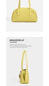 Stylish yellow pebbled leather shoulder bag with structured silhouette and polished hardware.