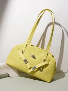 Chic yellow leather shoulder bag with chic turn-lock closure and elegant double straps.