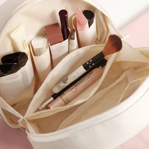 Grande trousse de maquillage coquillage avec compartiments pour le voyage et les cosmétiques.