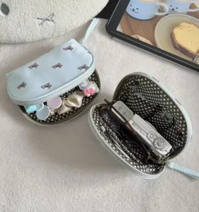 Portable travel makeup storage bag, cute dog print PU leather cosmetic pouch organizer.