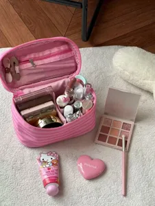 Pink striped cosmetic bag detail, large capacity portable storage pouch for travel.