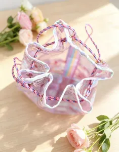 Transparent PVC bucket bag with drawstring, waterproof cosmetic and travel storage pouch.