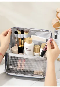 Large capacity travel cosmetic bag with compartments and brush slots for daily organization.