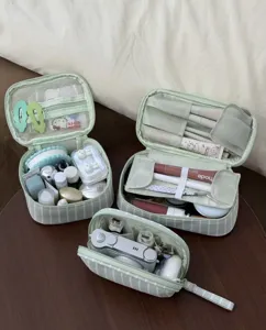 Striped cosmetic bag large capacity portable travel makeup organizer toiletry pouch.