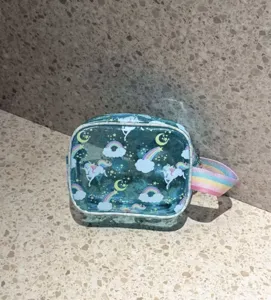 Transparent PVC cosmetic bag featuring cute unicorn print, portable waterproof travel makeup pouch.