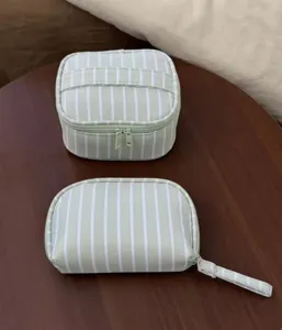 Green white striped cosmetic bag set, portable travel makeup storage pouch for women.