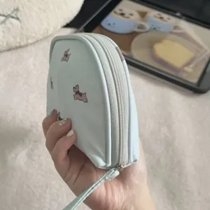 Cute mini cosmetic pouch with zipper and wrist strap portable makeup bag for travel daily use