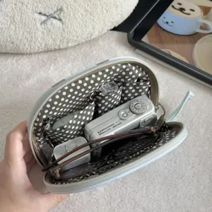Ins portable travel storage bag, multi-functional cosmetic and compact camera organizer pouch.