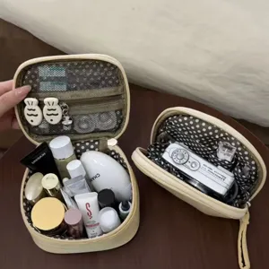 Yellow large capacity cosmetic bag, portable travel makeup organizer with compartments.