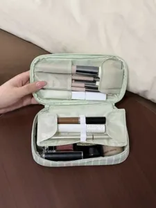 Cute striped makeup bag with large capacity, portable travel cosmetic organizer and toiletry pouch.