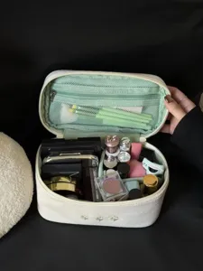 Large capacity floral cosmetic bag, portable travel makeup storage handbag for women daily use.