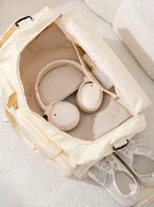 Große beige Sport Reisetasche und Fitnesstasche mit Kofferaufsteckfunktion für Damen