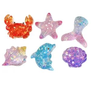 Ocean style resin DIY charms set, glitter starfish crab mermaid tail shell phone case decor.