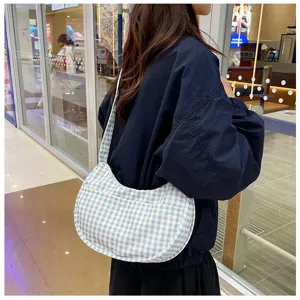 Stylish blue and white gingham shoulder bag for women, casual crescent dumpling bag daily use.