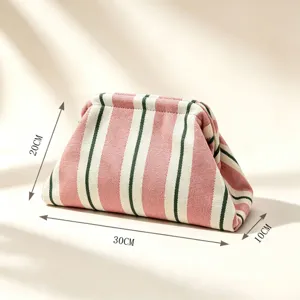 Knitted striped clutch makeup bag with kiss-lock, stylish pink and green stripes for daily use.